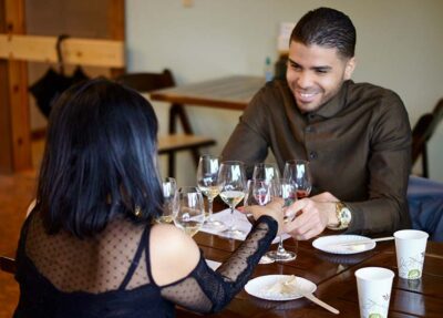 Couple enjoying a wine tasting.