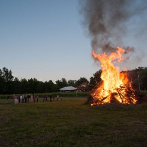 Large bonfire in a field.