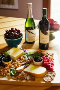 Silver Thread wine bottles with cheese board