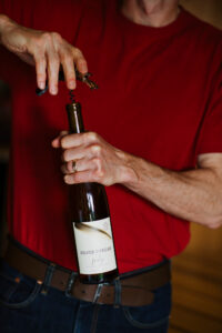 A bottle of Riesling being opened.