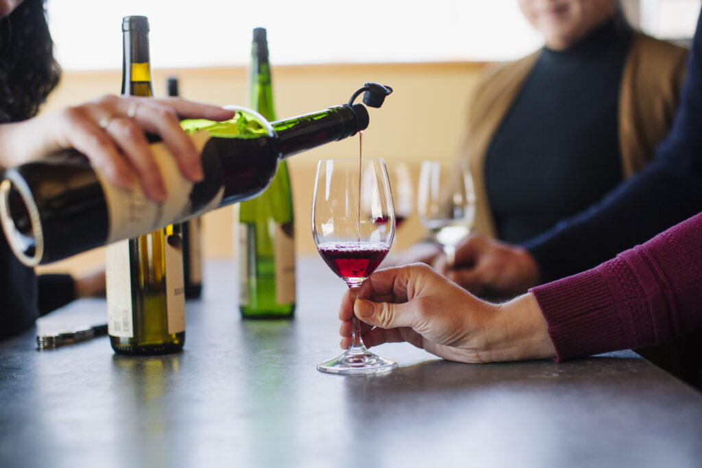 Glasses of wine on a table.