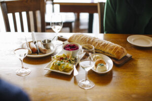 Wine and food on a table.