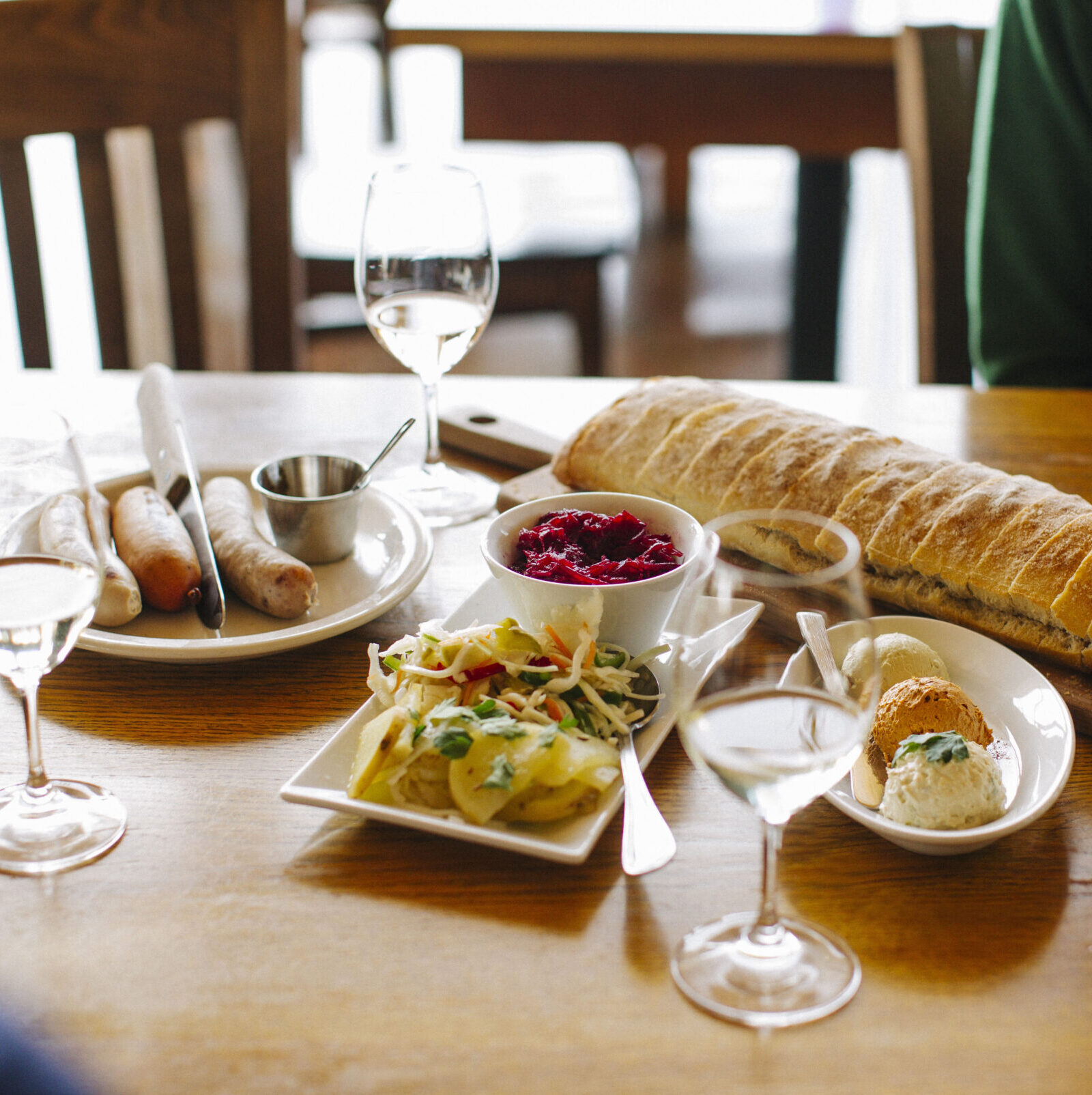 Wine and food on a table.