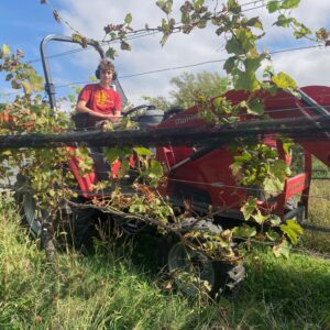 Trey driving the tractor