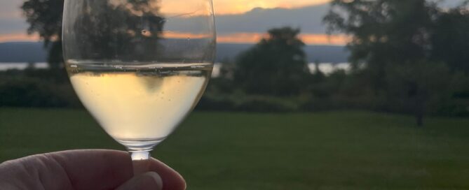 Glass of wine at sunset.