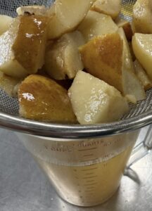 Spiced pears strained out of wine.