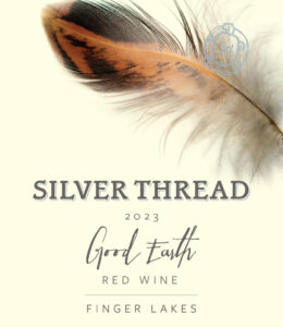 Red wine label with feather